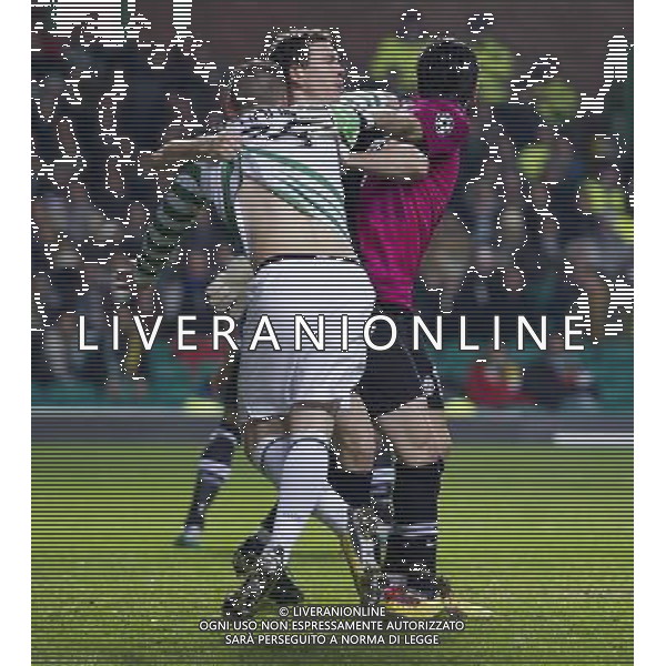 12/02/13 UEFA CHAMPIONS LEAGUE CELTIC v JUVENTUS CELTIC PARK - GLASGOW Celtic striker Gary Hooper (left) receives some rough treatment from Juventus pair Gianluigi Buffon (right) and Stephan Lichtsteiner ©/AGENZIA ALDO LIVERANI SAS - ITALY ONLY - EDITORIAL USE ONLY