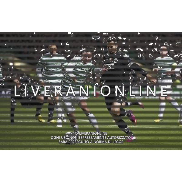 12/02/13 UEFA CHAMPIONS LEAGUE CELTIC v JUVENTUS CELTIC PARK - GLASGOW Celtic\'s Mikael Lustig (left) challenges Mirko Vucinic ©/AGENZIA ALDO LIVERANI SAS - ITALY ONLY - EDITORIAL USE ONLY