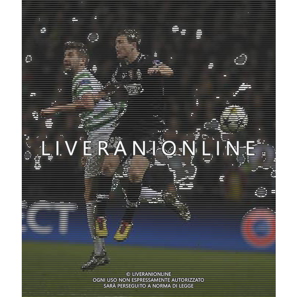 Celtic Park Glasgow Celtic v Juventus Champions League First knockout round 12/02/13 Charlie Mulgrew (Celtic) Stephan Lichsteiner (Juventus) Photo: Roger Parker Fotosports International AG ALDO LIVERANI S A S ONLY ITALY