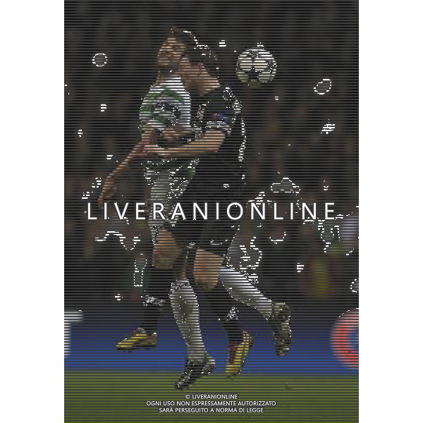 Celtic Park Glasgow Celtic v Juventus Champions League First knockout round 12/02/13 Charlie Mulgrew (Celtic) Stephan Lichsteiner (Juventus) Photo: Roger Parker Fotosports International AG ALDO LIVERANI S A S ONLY ITALY