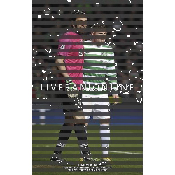 Celtic Park Glasgow Celtic v Juventus (0-3) Champions League First knockout round 12/02/13 Scott Brown (Celtic) and Gianluigi Buffon (Juventus) Photo: Roger Parker Fotosports International AG ALDO LIVERANI S A S ONLY ITALY