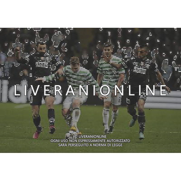Celtic Park Glasgow Celtic v Juventus (0-3) Champions League First knockout round 12/02/13 Kris Commons (Celtic) Claudio Marchisio, Arturo Vidal (Juventus) Photo: Roger Parker Fotosports International AG ALDO LIVERANI S A S ONLY ITALY