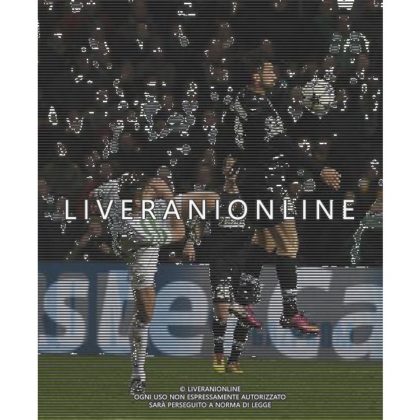 Celtic Park Glasgow Celtic v Juventus (0-3) Champions League First knockout round 12/02/13 Charlie Mulgrew (Celtic) Mirko Vucinic (Juventus) Photo: Roger Parker Fotosports International AG ALDO LIVERANI S A S ONLY ITALY