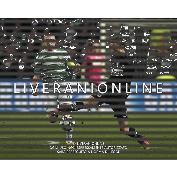 Celtic Park Glasgow Celtic v Juventus (0-3) Champions League First knockout round 12/02/13 Scott Brown (Celtic) Claudio Marchisio (Juventus) Photo: Roger Parker Fotosports International AG ALDO LIVERANI S A S ONLY ITALY