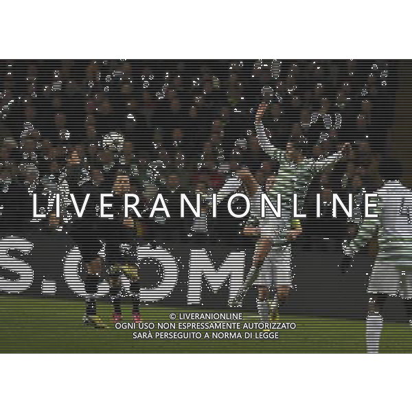 Celtic Park Glasgow Celtic v Juventus Champions League First knockout round 12/02/13 Mikael Lustig (Celtic) Alessandro Matri (Juventus) Photo: Roger Parker Fotosports International AG ALDO LIVERANI S A S ONLY ITALY