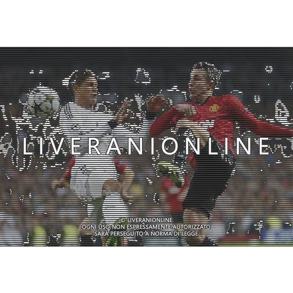 Madrid (03/02/2013).- Estadio Santiago Bernabeu. UEFA Champions League Real Madrid - Manchester United Raphael Varane, Robin van Persie. Photo: Alex Cid-Fuentes / ALFAQUI /AGENZIA ALDO LIVERANI SAS - ITALY ONLY - EDITORIAL USE ONLY