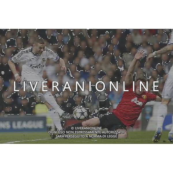 Real Madrid\'s Karim Benzema and Manchester United\'s Phil Jones during Champions League match on february 13th 2013. Photo: Cid-Fuentes Cebolla / ALFAQUI /AGENZIA ALDO LIVERANI SAS - ITALY ONLY - EDITORIAL USE ONLY