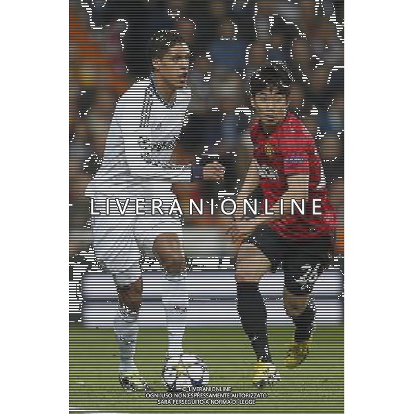 Real Madrid\'s Raphael Varane and Manchester United\'s Shinji Kagawa during Champions League match on february 13th 2013. Photo: Cid-Fuentes Cebolla / ALFAQUI /AGENZIA ALDO LIVERANI SAS - ITALY ONLY - EDITORIAL USE ONLY