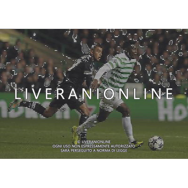 Celtic Park Glasgow Celtic v Juventus (0-3) Champions League First knockout round 12/02/13 Victor Wanyama (Celtic) Arturo Vidal (Juventus) Photo: Roger Parker Fotosports International ©Photoshot/AGENZIA ALDO LIVERANI SAS-ITALY ONLY - EDITORIAL USE ONLY