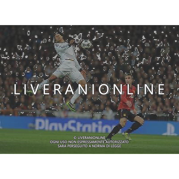 Raphael Varane Real Madrid 2012/13 Robin Van Persie Manchester United Real Madrid Vs Manchester United 13/02/13 The Champions League Photo: Robin Parker Fotosports International ©Photoshot/AGENZIA ALDO LIVERANI SAS-ITALY ONLY - EDITORIAL USE ONLY