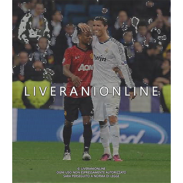 Cristiano Ronaldo and Manchester United Patrice Evra after the final whistle Real Madrid 2012/13 Real Madrid Vs Manchester United (1-1) 13/02/13 The Champions League Photo: Robin Parker Fotosports International ©Photoshot/AGENZIA ALDO LIVERANI SAS-ITALY ONLY - EDITORIAL USE ONLY