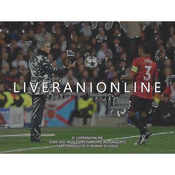 Jose Mourinho Manager throws the ball back to Manchester United\'s Patrice Evra Real Madrid 2012/13 Real Madrid Vs Manchester United (1-1) 13/02/13 The Champions League Photo: Robin Parker Fotosports International ©Photoshot/AGENZIA ALDO LIVERANI SAS-ITALY ONLY - EDITORIAL USE ONLY