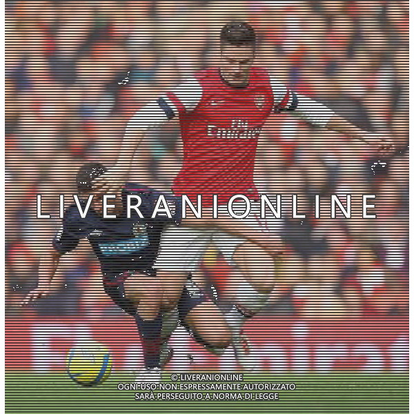 Blackburn Rovers\' Jason Lowe battles with Arsenal\'s Olivier Giroud - Credit - CameraSport - Karyn Haddon - Football - FA Challenge Cup Fifth Round - Arsenal v Blackburn Rovers - Saturday 16th February 2013 - Emirates stadium - London © CameraSport - 43 Linden Ave. Countesthorpe. Leicester. England. LE8 5PG - Tel: +44 (0) 116 277 4147 - admin@camerasport.com - www.camerasport.com AG ALDO LIVERANI S A S ONLY ITALY