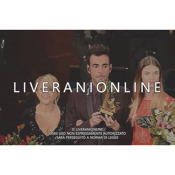 63mo Festival della canzone italiana di SanRemo Quinta Serata Finale 16 febbraio 2013 nella foto il vincitore Marco Mengoni con luciana Littizzetto e Bianca Balti ©/AGENZIA ALDO LIVERANI SAS