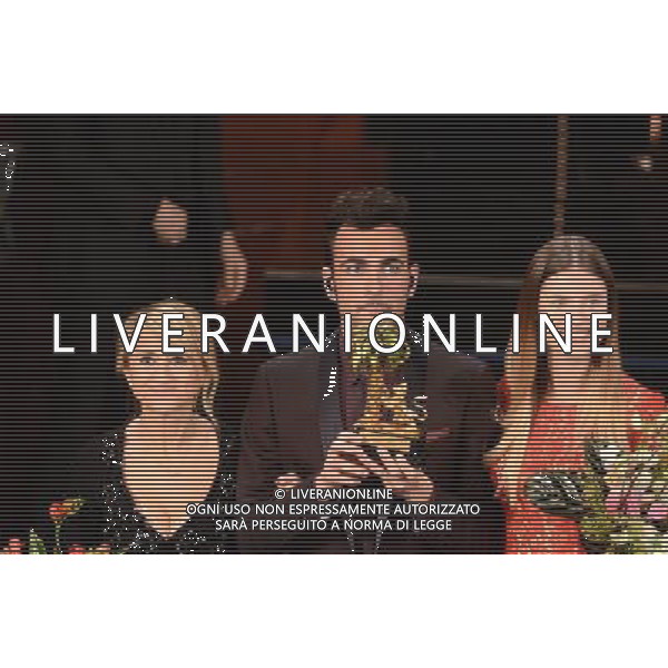 63mo Festival della canzone italiana di SanRemo Quinta Serata Finale 16 febbraio 2013 nella foto il vincitore Marco Mengoni con luciana Littizzetto e Bianca Balti ©/AGENZIA ALDO LIVERANI SAS