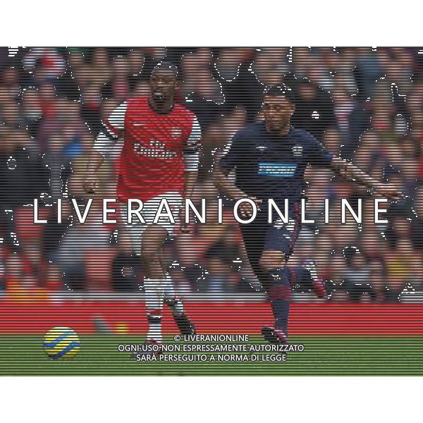 Arsenal\'s Abou Diaby and Blackburn Rovers\' Colin Kazim-Richards - Credit - CameraSport - Karyn Haddon - Football - FA Challenge Cup Fifth Round - Arsenal v Blackburn Rovers - Saturday 16th February 2013 - Emirates stadium - London © CameraSport - 43 Linden Ave. Countesthorpe. Leicester. England. LE8 5PG - Tel: +44 (0) 116 277 4147 - admin@camerasport.com - www.camerasport.com AG ALDO LIVERANI S A S ONLY ITALY