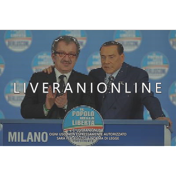 MILANO 18/2/2013 FIERAMILANOCITY COMIZIO ELETTORALE DEL POPOLO DELLA LIBERTA\' NELLA FOTO SILVIO BERLUSCONI E ROBERTO MARONI FOTO ROMANO/AG ALDO LIERANI