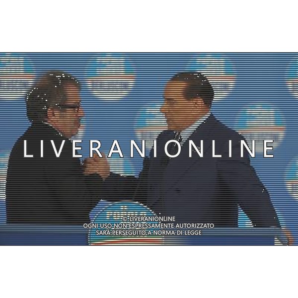 MILANO 18/2/2013 FIERAMILANOCITY COMIZIO ELETTORALE DEL POPOLO DELLA LIBERTA\' NELLA FOTO SILVIO BERLUSCONI E ROBERTO MARONI FOTO ROMANO/AG ALDO LIERANI