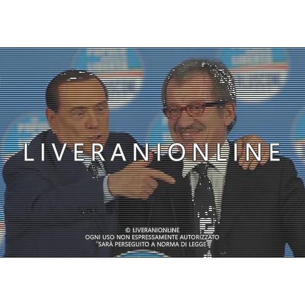MILANO 18/2/2013 FIERAMILANOCITY COMIZIO ELETTORALE DEL POPOLO DELLA LIBERTA\' NELLA FOTO SILVIO BERLUSCONI E ROBERTO MARONI FOTO ROMANO/AG ALDO LIERANI
