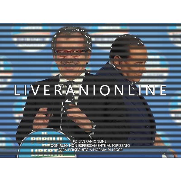 MILANO 18/2/2013 FIERAMILANOCITY COMIZIO ELETTORALE DEL POPOLO DELLA LIBERTA\' NELLA FOTO SILVIO BERLUSCONI E ROBERTO MARONI FOTO ROMANO/AG ALDO LIERANI