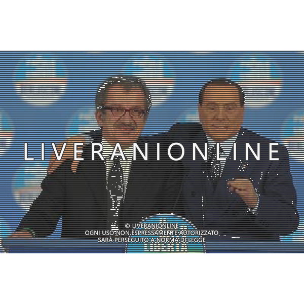 MILANO 18/2/2013 FIERAMILANOCITY COMIZIO ELETTORALE DEL POPOLO DELLA LIBERTA\' NELLA FOTO SILVIO BERLUSCONI E ROBERTO MARONI FOTO ROMANO/AG ALDO LIERANI