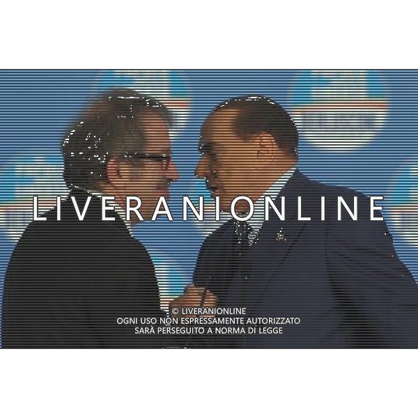 MILANO 18/2/2013 FIERAMILANOCITY COMIZIO ELETTORALE DEL POPOLO DELLA LIBERTA\' NELLA FOTO SILVIO BERLUSCONI E ROBERTO MARONI FOTO ROMANO/AG ALDO LIERANI