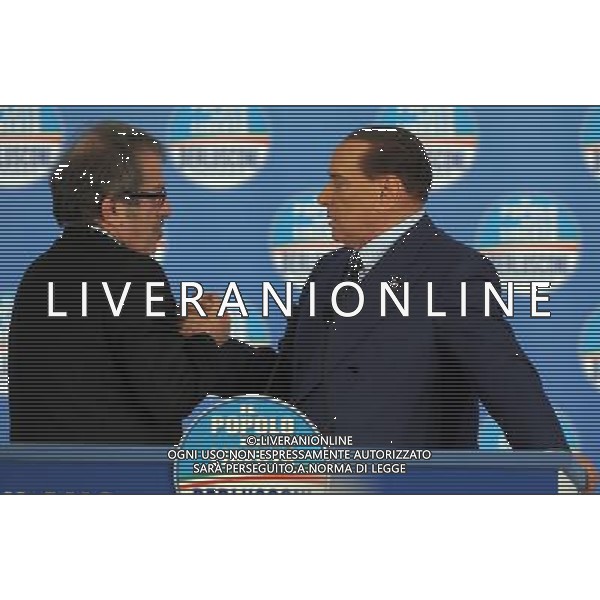MILANO 18/2/2013 FIERAMILANOCITY COMIZIO ELETTORALE DEL POPOLO DELLA LIBERTA\' NELLA FOTO SILVIO BERLUSCONI E ROBERTO MARONI FOTO ROMANO/AG ALDO LIERANI