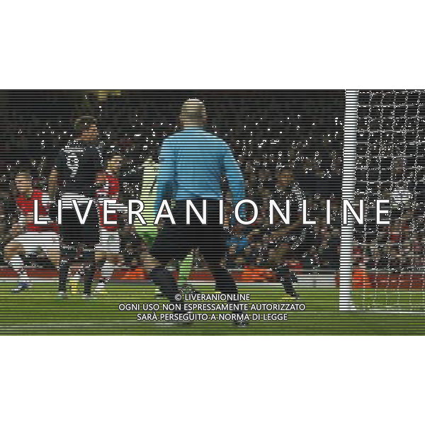 Arsenal\'s Lukas Podolski scores his sides first goal 1-2 - Credit - CameraSport - KARYN HADDON - Football - UEFA Champions League Round of 16 First Leg - Arsenal v Bayern Munich - Tuesday 19th February 2013 - Emirates Stadium - London © CameraSport - 43 Linden Ave. Countesthorpe. Leicester. England. LE8 5PG - Tel: +44 (0) 116 277 4147 - admin@camerasport.com - www.camerasport.com AG ALDO LIVERANI S A S ONLY ITALY