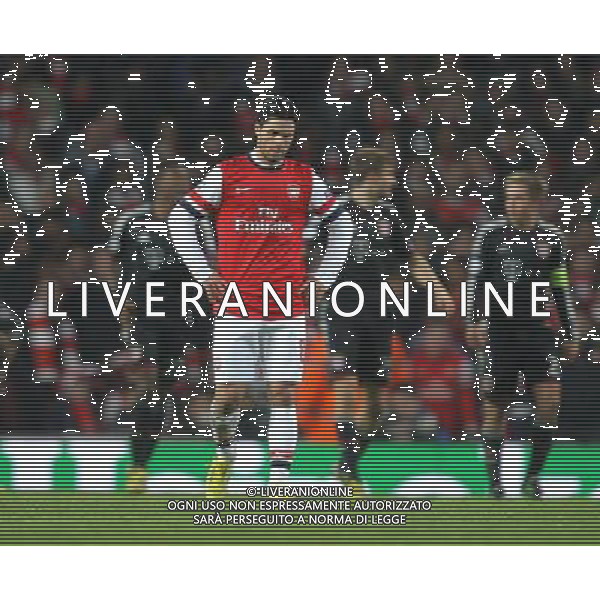Arsenal\'s Mikel Arteta shows his dejection as Bayern Munich take a 3-1 lead - Credit - CameraSport - KARYN HADDON - Football - UEFA Champions League Round of 16 First Leg - Arsenal v Bayern Munich - Tuesday 19th February 2013 - Emirates Stadium - London © CameraSport - 43 Linden Ave. Countesthorpe. Leicester. England. LE8 5PG - Tel: +44 (0) 116 277 4147 - admin@camerasport.com - www.camerasport.com AG ALDO LIVERANI S A S ONLY ITALY
