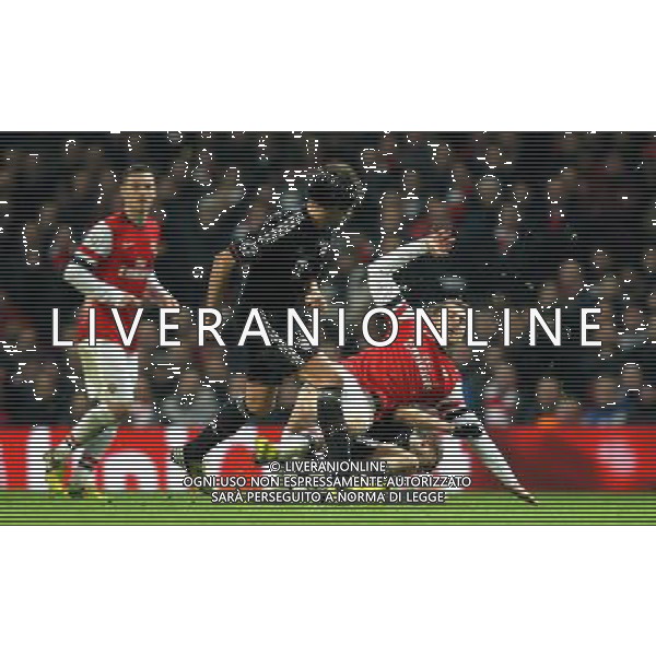 Arsenal\'s Aaron Ramsey is fouled by Bayern Munich\'s Bastian Schweinsteiger - Credit - CameraSport - KARYN HADDON - Football - UEFA Champions League Round of 16 First Leg - Arsenal v Bayern Munich - Tuesday 19th February 2013 - Emirates Stadium - London © CameraSport - 43 Linden Ave. Countesthorpe. Leicester. England. LE8 5PG - Tel: +44 (0) 116 277 4147 - admin@camerasport.com - www.camerasport.com AG ALDO LIVERANI S A S ONLY ITALY