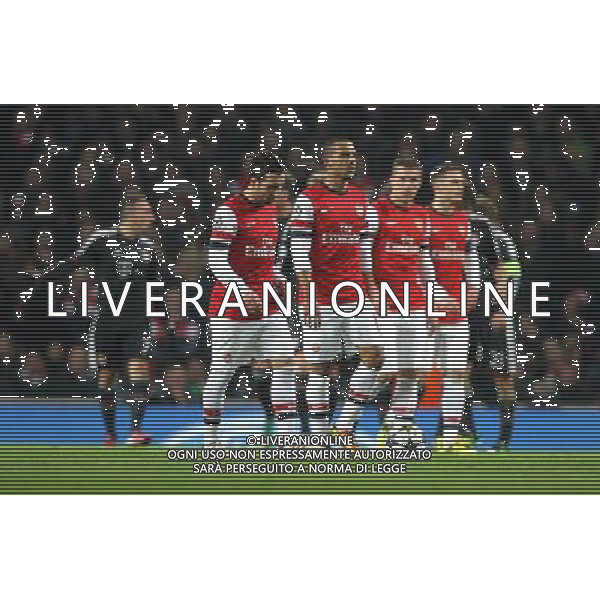 Arsenal show their dejection after Bayern Munich take a 2-0 lead - Credit - CameraSport - KARYN HADDON - Football - UEFA Champions League Round of 16 First Leg - Arsenal v Bayern Munich - Tuesday 19th February 2013 - Emirates Stadium - London © CameraSport - 43 Linden Ave. Countesthorpe. Leicester. England. LE8 5PG - Tel: +44 (0) 116 277 4147 - admin@camerasport.com - www.camerasport.com AG ALDO LIVERANI S A S ONLY ITALY