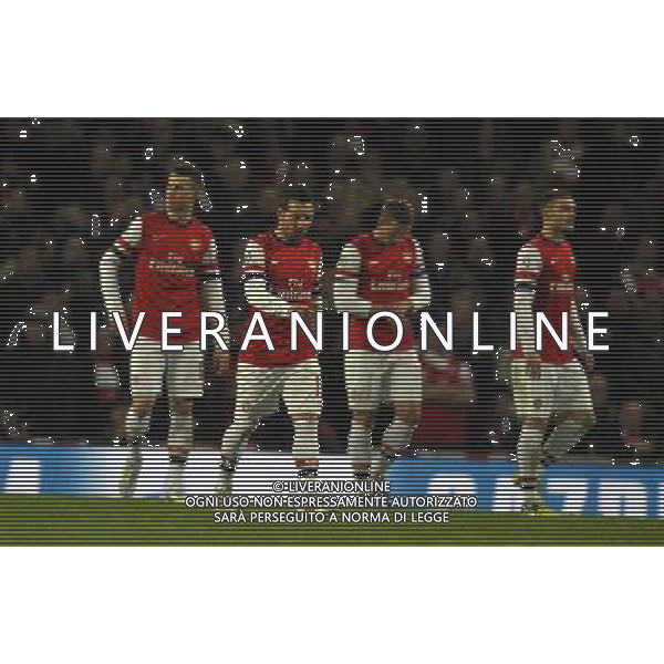 Emirates Stadium Arsenal v Bayern Munich (1-3) Champions League first Knockout Round 19/02/13 Dejected Santi Cazorla and Arsenal as Bayern Munich win convincingly Photo: Roger Parker Fotosports International AG ALDO LIVERANI S A S ONLY ITALY