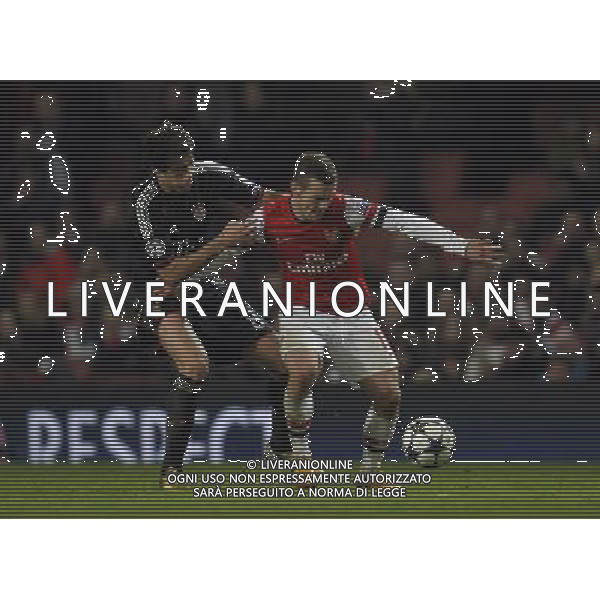 Emirates Stadium Arsenal v Bayern Munich Champions League first Knockout Round 19/02/13 Jack Wilshere (Arsenal) shiled the ball from Javi Martinez (Bayern Munich) Photo: Roger Parker Fotosports International AG ALDO LIVERANI S A S ONLY ITALY