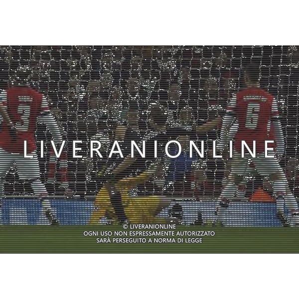 Emirates Stadium Arsenal v Bayern Munich Champions League first Thomas Muller (Bayern Munich) beats Wojciech Szczesny (Arsenal) to score second goal Photo: Roger Parker Fotosports International AG ALDO LIVERANI S A S ONLY ITALY