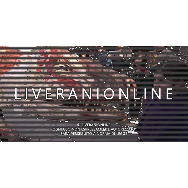 An Australovenator takes a walk around the London Festival Hall, south bank. Erth\'s acclaimed Dinosaur Petting Zoo is part of the SouthbankCentre\'s Imagine Children\'s Festival.. London ©Photoshot/AGENZIA ALDO LIVERANI SAS-ITALY ONLY - EDITORIAL USE ONLY