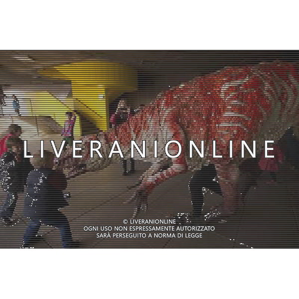 An Australovenator takes a walk around the London Festival Hall, south bank. Erth\'s acclaimed Dinosaur Petting Zoo is part of the SouthbankCentre\'s Imagine Children\'s Festival.. London ©Photoshot/AGENZIA ALDO LIVERANI SAS-ITALY ONLY - EDITORIAL USE ONLY