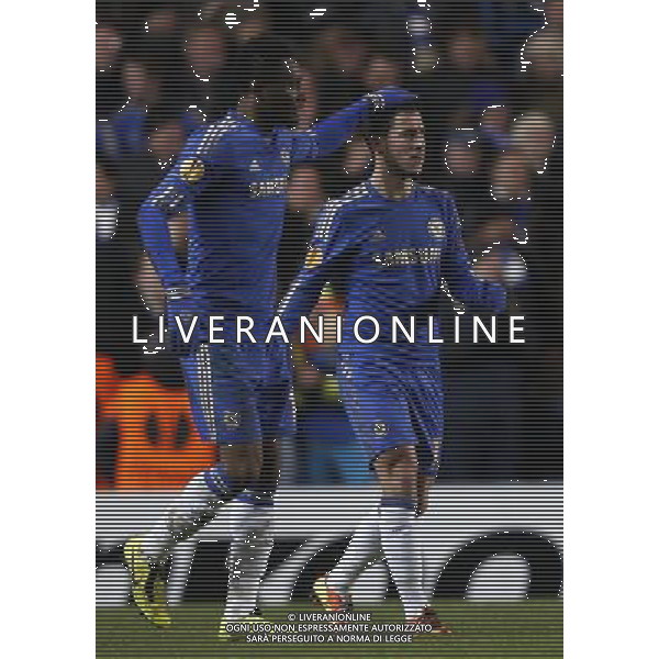 (130222) -- LONDON, Feb. 22, 2013 () -- Eden Hazard(R) of Chelsea celebrates his goal with teammate John Obi Mikel during the UEFA Europa League round of 32 second leg match between Chelsea and Sparta Prague at Stamford Bridge in London, Britain on February 21, 2013. The match ended with a 1-1 draw and Chelsea reached the last 16 with a 2-1 score in total. (/Wang Lili) ©photoshot/AGENZIA ALDO LIVERANI SAS - ITALY ONLY - EDITORIAL USE ONLY CHELSEA - SPARTA PRAGA EUROPA LEAGUE