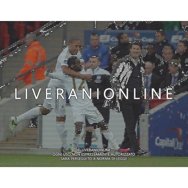 NATHAN DYER CELEBRATES IN FRONT OF MICHAEL LAUDRUP BRADFORD CITY V SWANSEA CITY BRADFORD CITY V SWANSEA CITY CAPITAL ONE FOOTBALL LEAGUE CUP FINAL 2013 WEMBLEY STADIUM, LONDON, ENGLAND 24 February 2013 GAQ66070 CAPITAL ONE CUP FINAL 2013 WARNING! This Photograph May Only Be Used For Newspaper And/Or Magazine Editorial Purposes. May Not Be Used For Publications Involving 1 player, 1 Club Or 1 Competition Without Written Authorisation From Football DataCo Ltd. For Any Queries, Please Contact Football DataCo Ltd on +44 (0) 207 864 9121