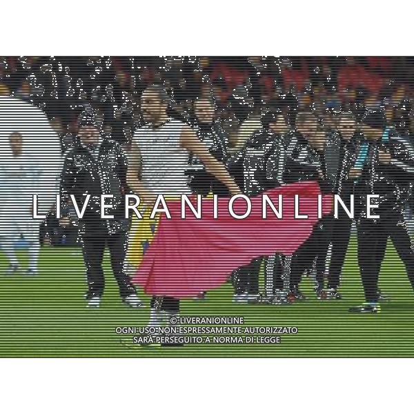 Wembley Stadium Bradford city v Swansea City (0-5) Capital One Cup Final 24/02/2013 Swansea\'s Chico Fiores, who did not play, celebrates by playing a matador routine after winnning the Capital One Cup Photo: Roger Parker Fotosports International ©PHOTOSHOT/AGENZIA ALDO LIVERANI SAS - ITALY ONLY - EDITORIAL USE ONLY