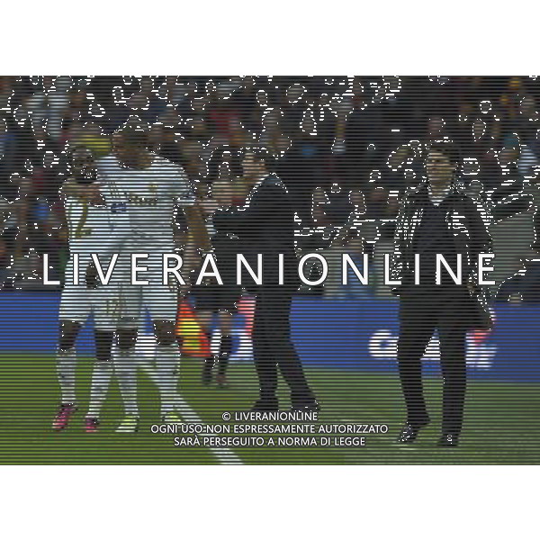 Wembley Stadium Bradford City v Swansea City (0-5( Capital One Cup Final 24/02/2013 Nathan Dyer (Swansea) celebrates with Ashley Williams as manager Michael Laudrup looking on after scoring first goal Photo: Roger Parker Fotosports International ©PHOTOSHOT/AGENZIA ALDO LIVERANI SAS - ITALY ONLY - EDITORIAL USE ONLY