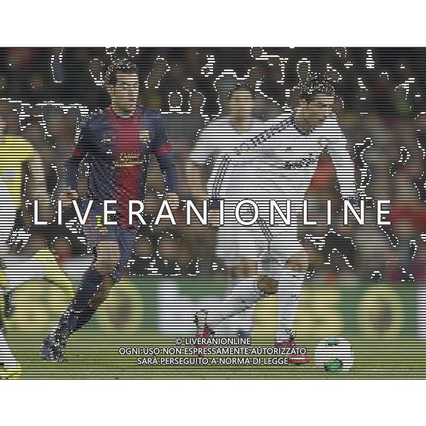 FC Barcelona\'s Sergio Busquets (l) and Real Madrid\'s Cristiano Ronaldo during Copa del Rey - King\'s Cup semifinal second match.February 26,2013. (ALFAQUI/Acero) AG ALDO LVERANI S A S ONLY ITALY