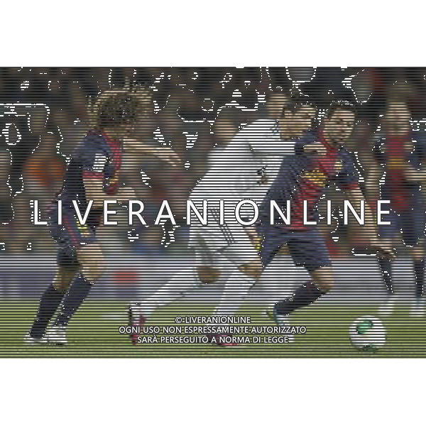 FC Barcelona\'s Carles Puyol (l) and Xavi Hernandez and Real Madrid\'s Cristiano Ronaldo during Copa del Rey - King\'s Cup semifinal second match.February 26,2013. (ALFAQUI/Acero) AG ALDO LVERANI S A S ONLY ITALY