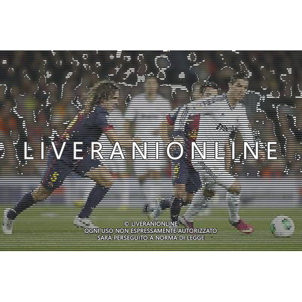FC Barcelona\'s Carles Puyol (l) and Xavi Hernandez and Real Madrid\'s Cristiano Ronaldo (r) during Copa del Rey - King\'s Cup semifinal second match.February 26,2013. (ALFAQUI/Acero) AG ALDO LVERANI S A S ONLY ITALY