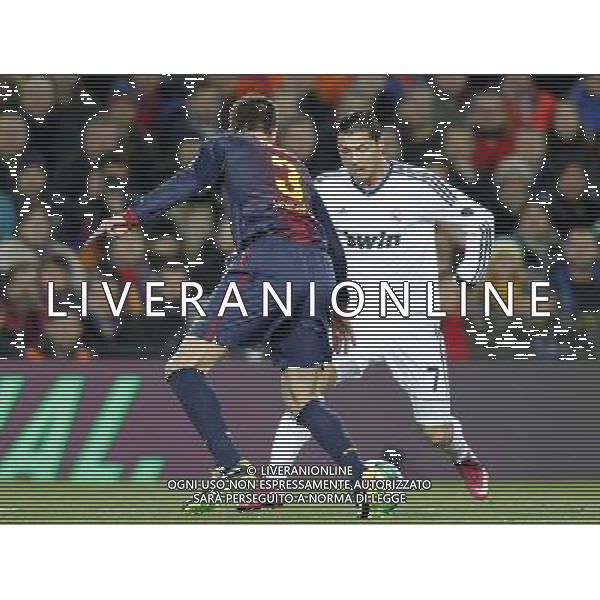 FC Barcelona\'s Gerard Pique (l) and Real Madrid\'s Cristiano Ronaldo during Copa del Rey - King\'s Cup semifinal second match.February 26,2013. (ALFAQUI/Acero) AG ALDO LVERANI S A S ONLY ITALY