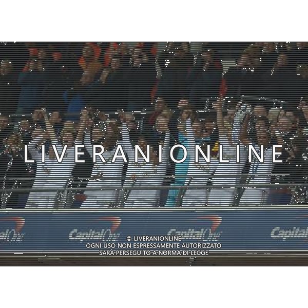 Swansea City\'s Ashley Williams lifts the Capital one trophy Football - Capital One Cup Final - Bradford City v Swansea City - Sunday 24th February 2013 - Wembley National Stadium - Wembley - London © CameraSport - 43 Linden Ave. Countesthorpe. Leicester. England. LE8 5PG - Tel: +44 (0) 116 277 4147 - admin@camerasport.com - www.camerasport.com ©photoshot/AGENZIA ALDO LIVERANI SAS - ITALY ONLY - EDITORIAL USE ONLY