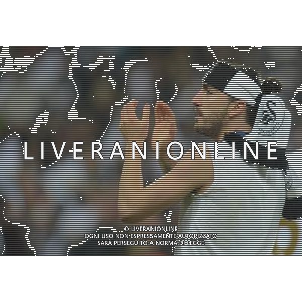 Swansea City\'s Chico celebrates winning the Capitalone League cup Football - Capital One Cup Final - Bradford City v Swansea City - Sunday 24th February 2013 - Wembley National Stadium - Wembley - London © CameraSport - 43 Linden Ave. Countesthorpe. Leicester. England. LE8 5PG - Tel: +44 (0) 116 277 4147 - admin@camerasport.com - www.camerasport.com ©photoshot/AGENZIA ALDO LIVERANI SAS - ITALY ONLY - EDITORIAL USE ONLY