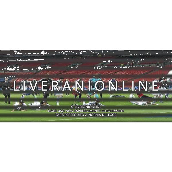 Swansea City players run and slide in celebration Football - Capital One Cup Final - Bradford City v Swansea City - Sunday 24th February 2013 - Wembley National Stadium - Wembley - London © CameraSport - 43 Linden Ave. Countesthorpe. Leicester. England. LE8 5PG - Tel: +44 (0) 116 277 4147 - admin@camerasport.com - www.camerasport.com ©photoshot/AGENZIA ALDO LIVERANI SAS - ITALY ONLY - EDITORIAL USE ONLY