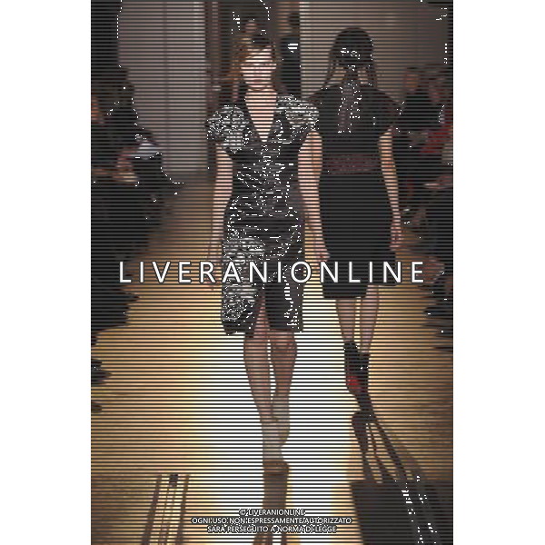A model walks the runway during the Rue du Mail Ready-To-Wear Fall/Winter 2013 show as part of Paris Fashion Week on February 28, 2013 in Paris, France. ©Photoshot/AGENZIA ALDO LIVERANI SAS-ITALY ONLY - EDITORIAL USE ONLY