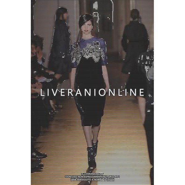 A model walks the runway during the Rue du Mail Ready-To-Wear Fall/Winter 2013 show as part of Paris Fashion Week on February 28, 2013 in Paris, France. ©Photoshot/AGENZIA ALDO LIVERANI SAS-ITALY ONLY - EDITORIAL USE ONLY