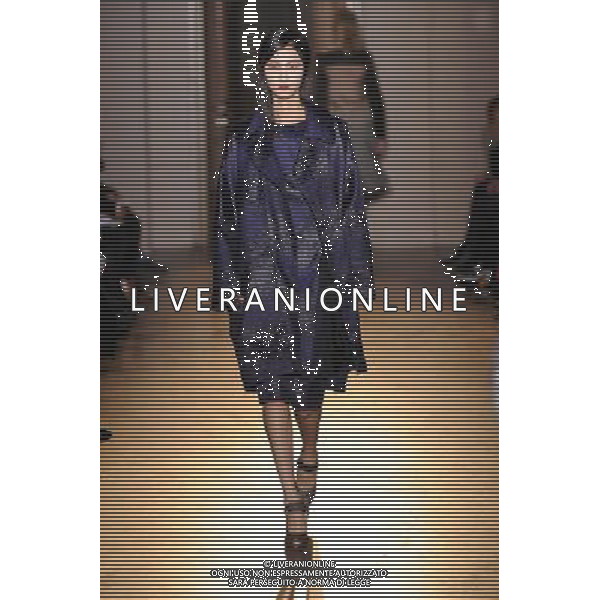 A model walks the runway during the Rue du Mail Ready-To-Wear Fall/Winter 2013 show as part of Paris Fashion Week on February 28, 2013 in Paris, France. ©Photoshot/AGENZIA ALDO LIVERANI SAS-ITALY ONLY - EDITORIAL USE ONLY